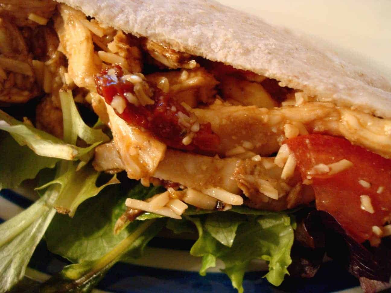 Shredded Chicken Pitas with Sun-dried Tomato Vinaigrette