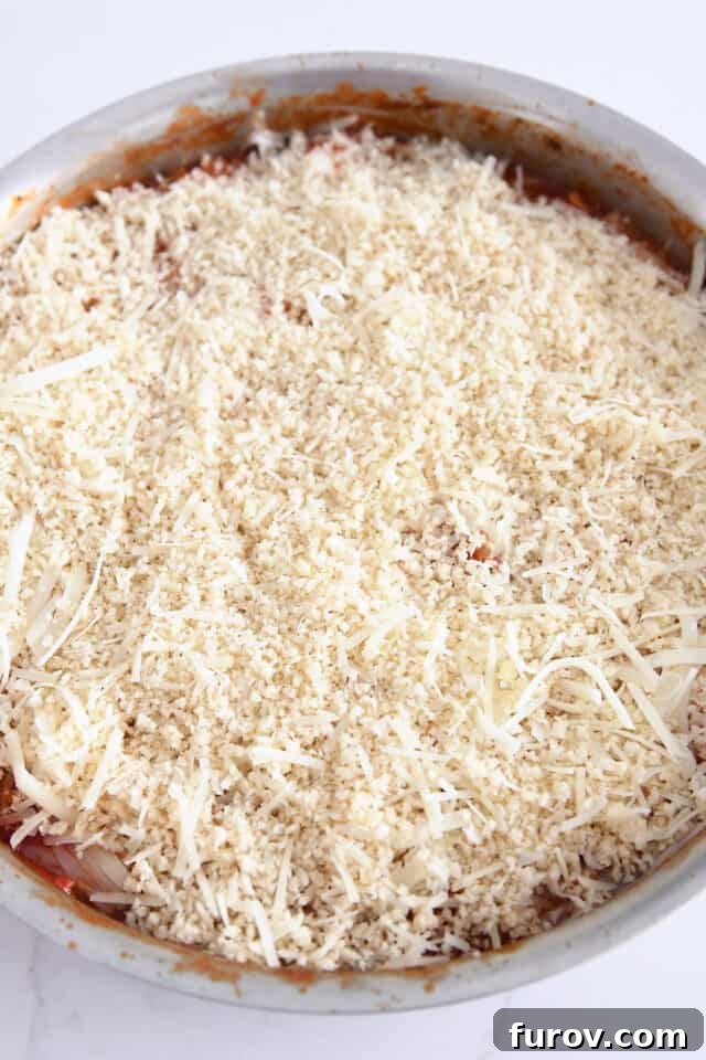 Sizzling Skillet Chicken Zucchini with Italian Cheeses 7 Panko bread crumbs and grated Parmesan cheese spread over the mozzarella on top of the skillet meal.