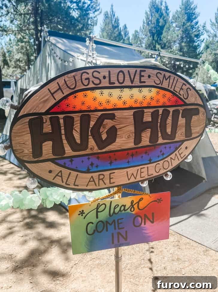 A creative and inviting 'Hug Hut' structure seen at a church camp, signaling warmth and community.