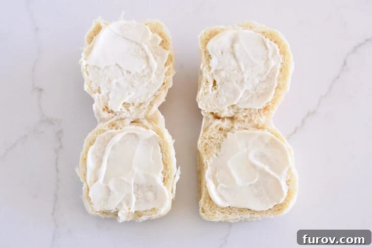 The Ultimate Leftover Turkey Sandwich: Restaurant Favorite At Home 4 Two rolls opened and spread with mayonnaise on each side.
