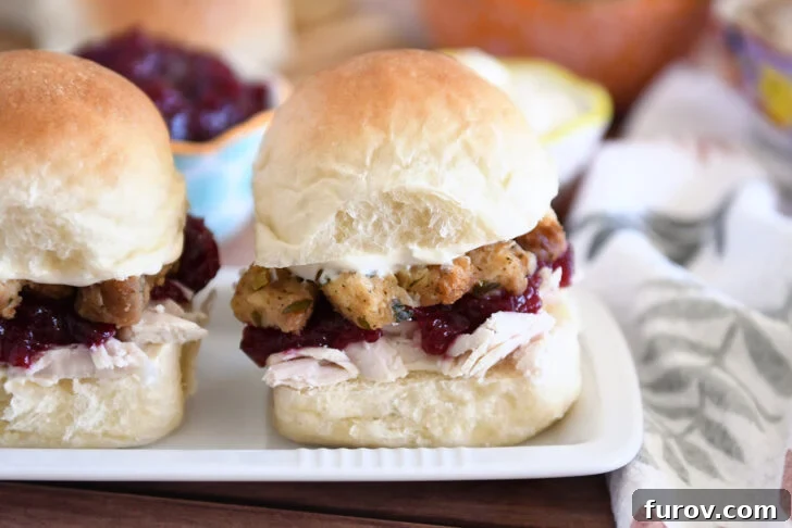 The Ultimate Leftover Turkey Sandwich: Restaurant Favorite At Home 8 Homemade roll sandwiched with shredded turkey, cranberry sauce, stuffing and mayo.
