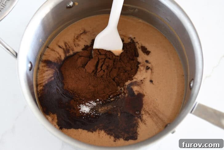 Irresistible No-Bake Chocolate Cookies 5 Saucepan with rich cocoa powder and salt stirred into the melted peanut butter mixture.
