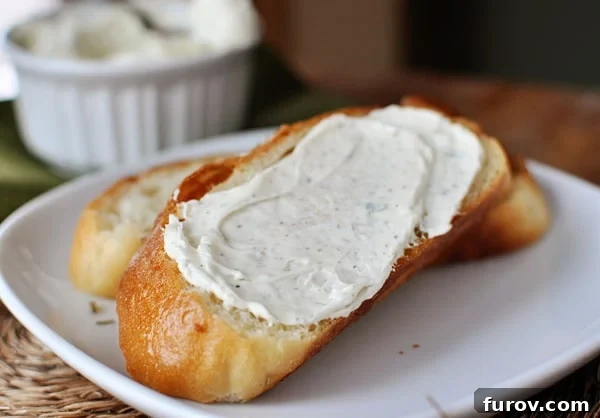 Zesty Garlic and Herb Butter 3 Slice of artisan bread generously covered with garlic herb butter mixture.