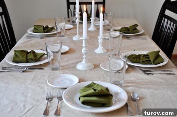 Your Guide to Perfect Family Candlelit Dinners Recipes and Atmosphere 11 A beautiful candlelight dinner setup in a home, with elegant place settings and a warm, inviting glow.