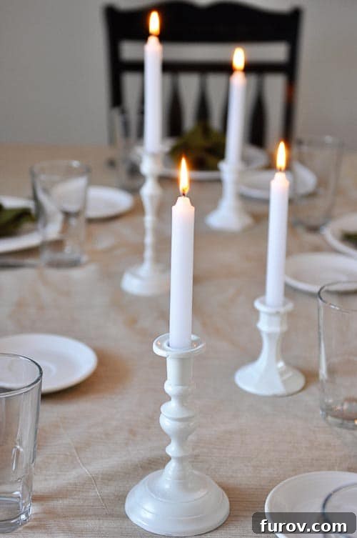 Your Guide to Perfect Family Candlelit Dinners Recipes and Atmosphere 6 White taper candles beautifully arranged on a thoughtfully set dinner table, enhancing the romantic ambiance.