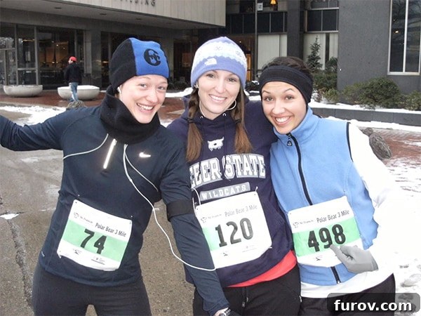 Stefani with two friends at her first 5K race, smiling brightly and celebrating