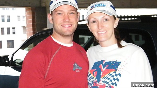 Stefani and her husband smiling confidently before the half marathon race