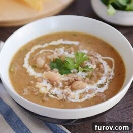 A bowl of roasted garlic white bean chili.