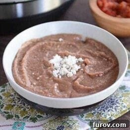 Homemade Refried Beans in a white bowl