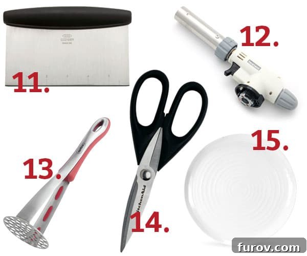 A versatile OXO Good Grips bench scraper being used to divide dough on a floured surface.