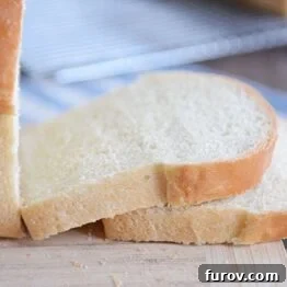 A delicious slice of homemade white sandwich bread.