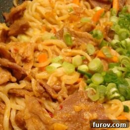 A close-up of the finished Chiang Mai Noodles dish.