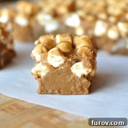 A delectable square of Root Beer Float Fudge topped with mini marshmallows, ready for serving.