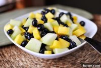 Honeydew Blueberry Mango Bliss with Zesty Lime Ginger Drizzle