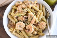 Vibrant Pesto Shrimp Pasta with Sun Kissed Tomatoes