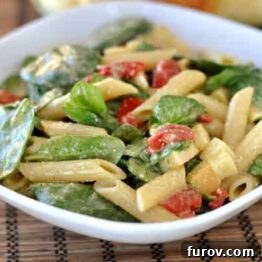 Smoked Mozzarella and Penne Spinach Salad with a creamy dressing
