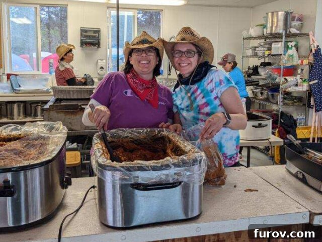 Girls' Camp Food Planning: Menus, Tips and Resources for Large Groups 12 Two women in cowboy hats smiling for camera.