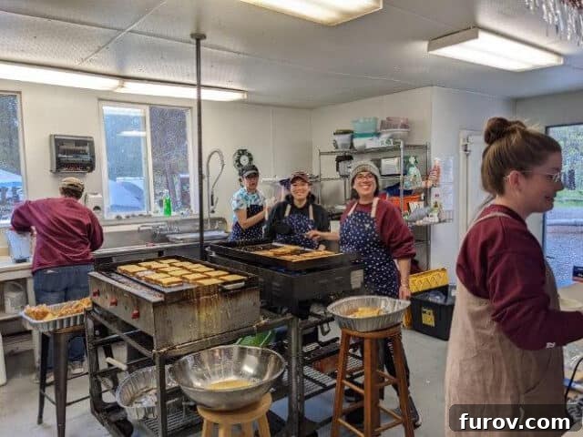 Girls' Camp Food Planning: Menus, Tips and Resources for Large Groups 3 Making French toast in camp kitchen.