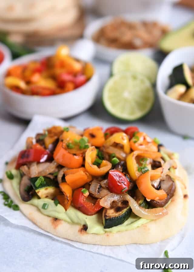 Creamy Avocado & Roasted Garden Flatbread 7 Flatbread with creamy avocado sauce and roasted vegetables.
