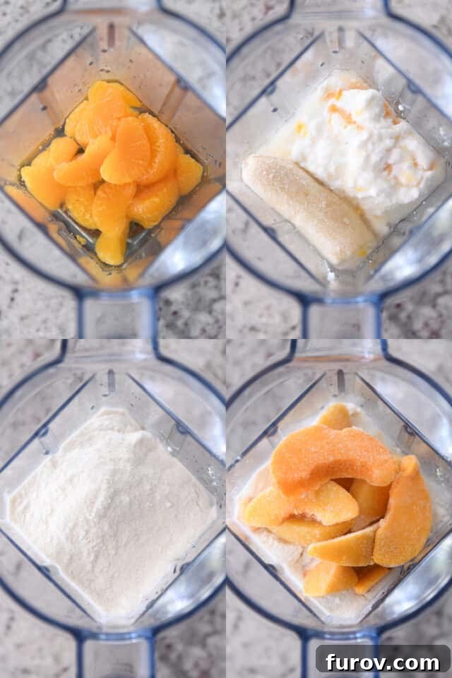 A high-angle shot of a blender filled with the key ingredients for the peach orange protein smoothie: vibrant mandarin oranges, creamy Greek yogurt, frozen banana, scoops of protein powder, and frosty peach slices, ready for blending.