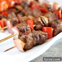A delicious grilled steak and veggie kebab with a perfect char.