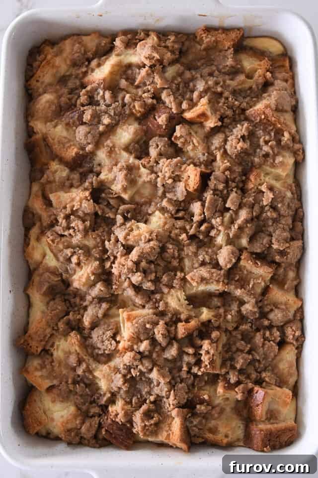 Cinnamon Streusel French Toast Casserole 6 White pan with baked bread cubes for French toast bake and cinnamon streusel.