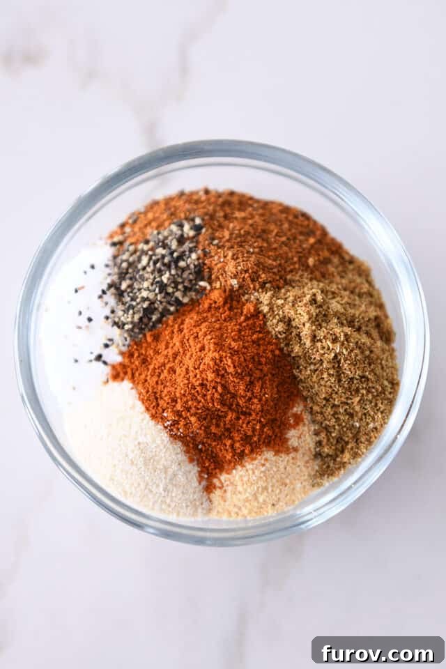 One-Pot Wonder Lentil Tacos 5 Small glass bowl with paprika, chili powder, cumin, pepper, salt, onion powder and garlic powder.