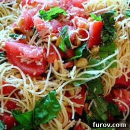 Close-up of freshly prepared Angel Hair Pasta Salad in a bowl.