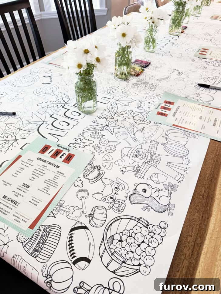 Dining table set with a giant coloring page as a runner and crayons
