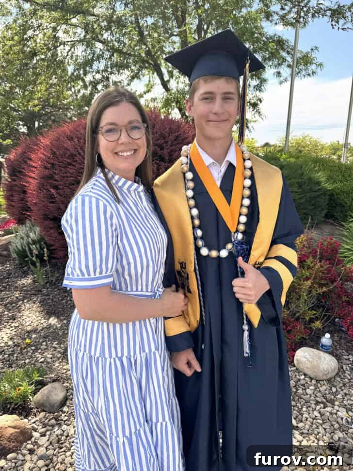 Friday Focus: My Current Chapter 5 A proud mother and son standing together, the son in his graduation robe, marking a significant life achievement.