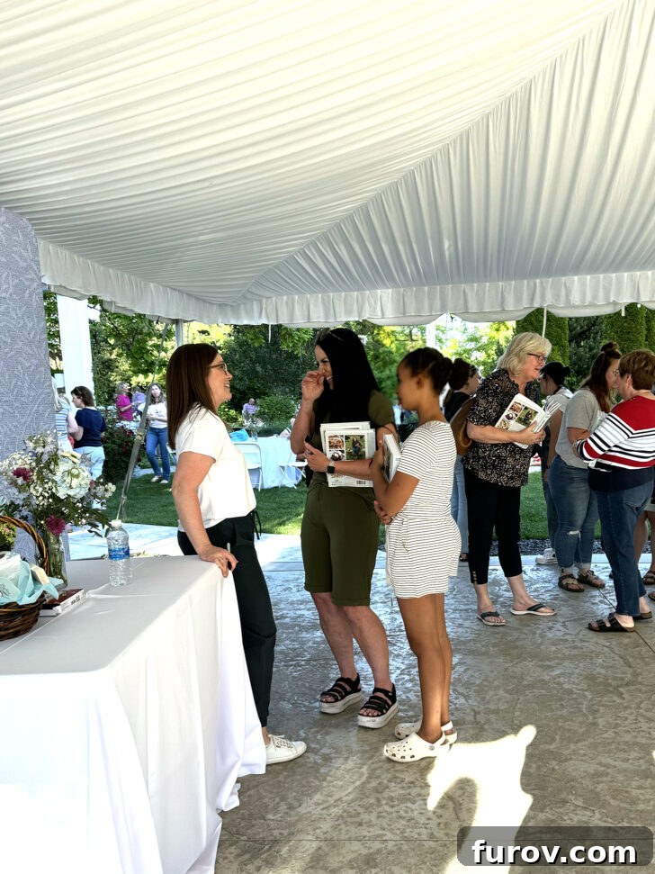 Friday Focus: My Current Chapter 9 Mel warmly greeting guests and signing cookbooks at her successful cookbook launch event.