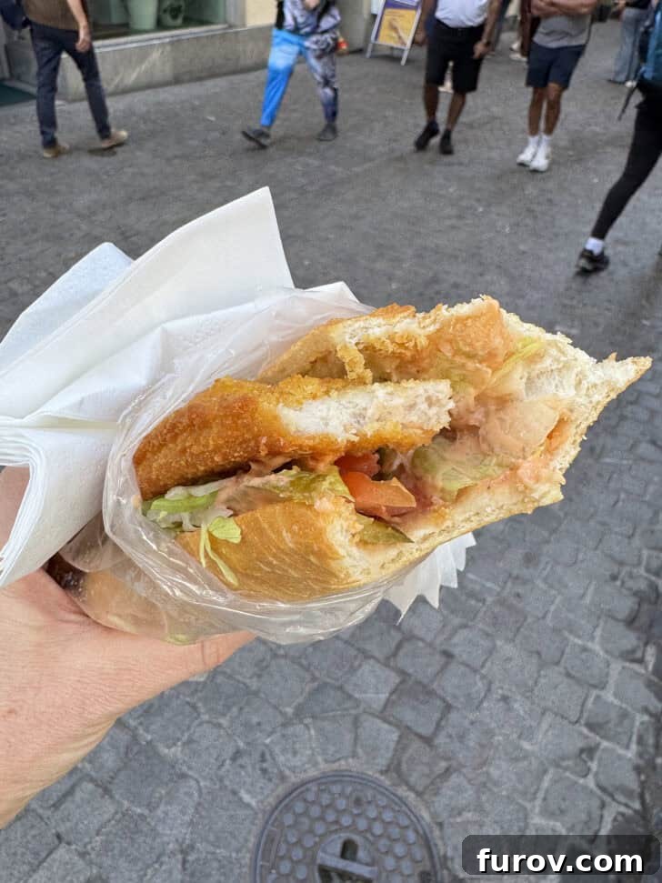 Chicken schnitzel sandwich from Twiny Station, with text that mentions Mel's Kitchen Cafe Friday Thoughts.