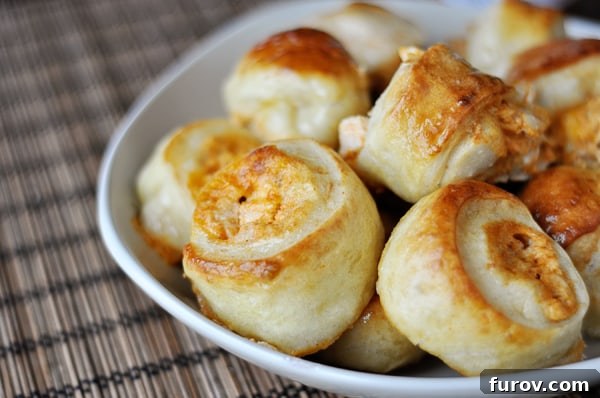 White bowl with golden-brown cooked buffalo chicken bites, ready to be served as an appetizer.