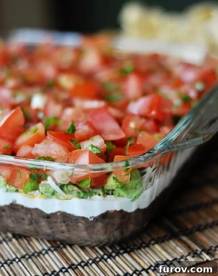 Glass 9x13 full of 7 layer dip.