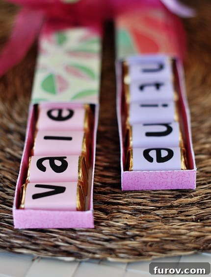 Two exquisitely crafted, half-opened homemade Valentine's Day chocolate boxes, each containing an assortment of wrapped chocolates.