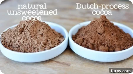 a white bowl of natural unsweetened cocoa next to a white bowl of dutch-process cocoa