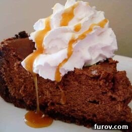 Overhead view of a beautiful, whole Chocolate Caramel Cheesecake in a springform pan.