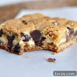 Cheesecake Stuffed Chocolate Chip Cookie Bars
