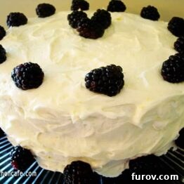 Perfect Lemon Cake with vibrant lemon zest and a creamy frosting.