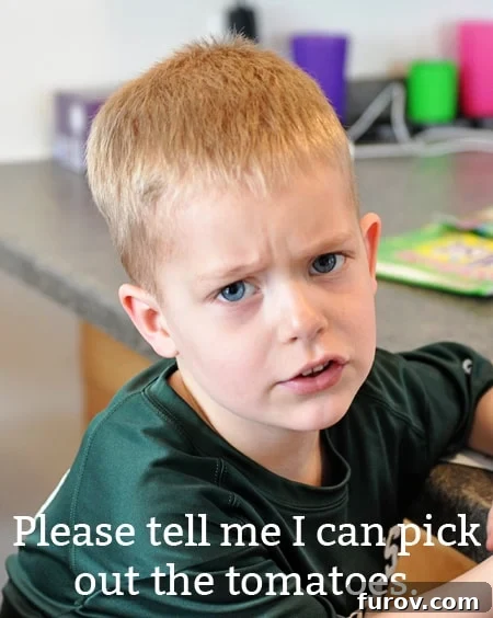 10 Ways to Inspire Little Food Adventurers 2 a little boy looking unhappy about eating his meal