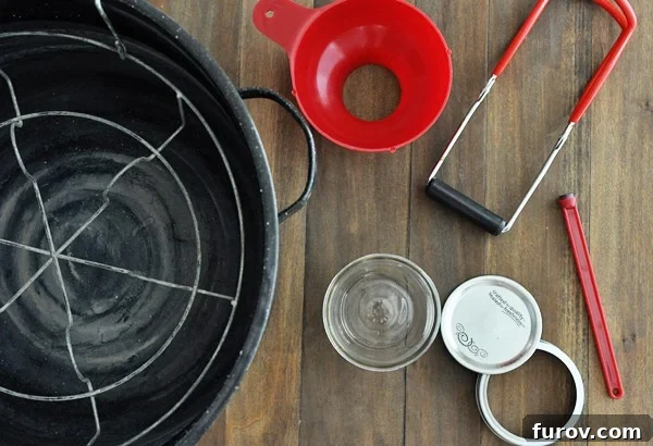 top view of a big pot and canning utensils
