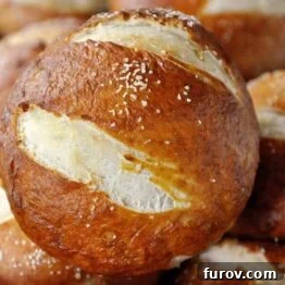 Pillowy Soft Pretzel Buns 5 A perfectly baked soft pretzel roll, golden brown and sprinkled with coarse salt.