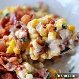 A delicious bowl of Creamy Confetti Corn with Bacon, ready to be served.