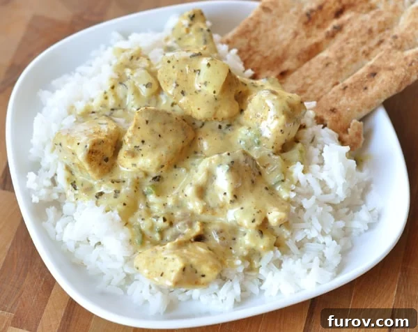Emerald Basil Coconut Chicken 7 chicken and creamy coconut sauce over white rice. A complete dish ready to eat.