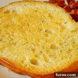 Crispy, buttery garlic bread slices ready to be frozen or baked