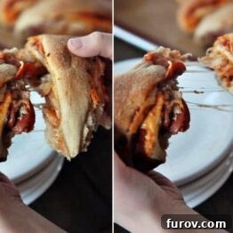 Close-up of a hand pulling apart a delicious whole wheat pizza roll, revealing the cheesy filling.