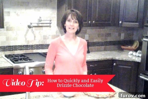 A lady in a kitchen demonstrating chocolate drizzling with the text Video Tip: Drizzling Chocolate