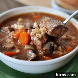 A smaller image of the hearty Slow Cooker Beef and Barley Soup in a bowl.