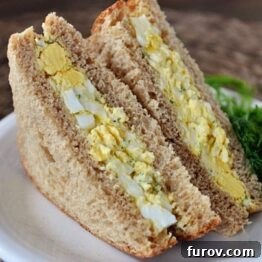 A beautifully presented classic egg salad sandwich.