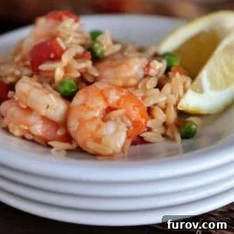 A small bowl of the baked shrimp and orzo with feta cheese.